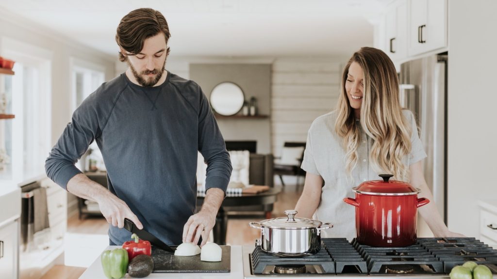 man-cooking-with-woman