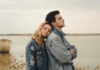 couple-standing-near-the-lake